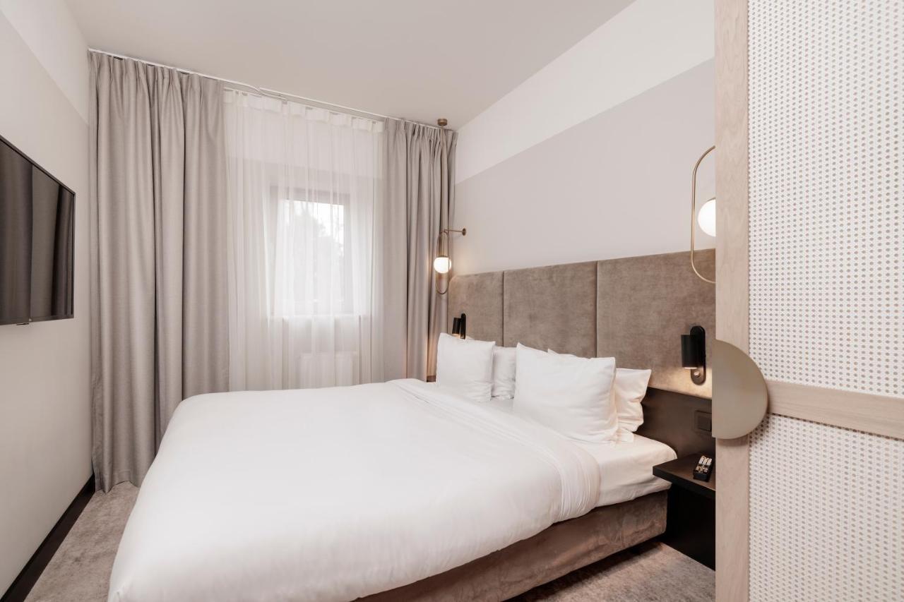 Royal Tulip Sand Kolobrzeg Dış mekan fotoğraf A bedroom at the hotel